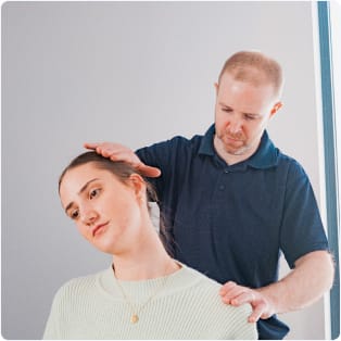 Sore neck being treated