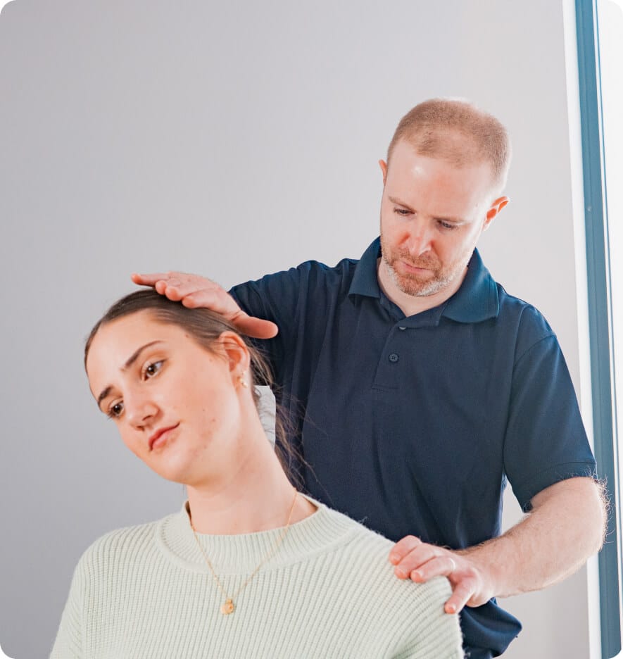 Physio treating neck pain